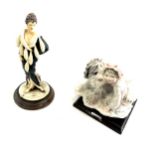 Two hand painted signed figures one G.Armani girl and dog the other a lady figure signed,