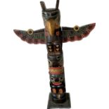Small novelty wiiden totem pole ,approximate height 24 inches, width 18 inches