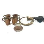 Selection of vintage copper signed handled cups, a strainer and a brass horn