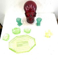 Selection of vintage novelty coloured glassware to include Skeleton head, dressing table set etc