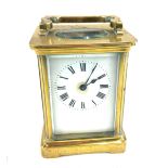 Vintage miniature carriage clock with key measures approx 4.5 inches tall