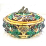 Majolica pie dish with a bird finial lid small chips to base and crack measures approx 12 inches