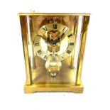 Vintage brass mantel clock signed S.Haller Germany measures approx 8 inches tall by 5.5 inches wide