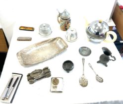 Selection of silver ware items to include tea pot, novelty items, german stein etc