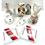 Selection of assorted pottery figures includes toby jug Lladro lady figure, beswick beneagles scotch