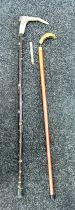 2 Vintage walking sticks includes brass head flask stick, and a horn handled walking stick