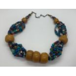 Large vintage tribal necklace with amber beads, total weight 260g