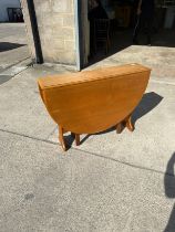 Vintage Rosewood drop leaf table measures approximately 29 inches tall 41 inches wide 9.5 inches