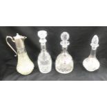 Selection of vintage glass decanters two with tags Whisky and Sherry tallest measures approx 12
