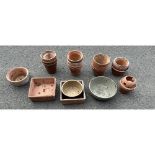 Large selection of various sized terracotta plant pots largest measures 10 inches tall by 13.5
