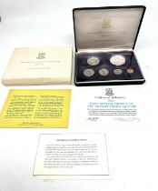 boxed first coinage of the british virgin islands by franklin mint tarnished one side of coins