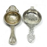 2 Silver tea strainers