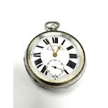 silver open face pocket watch the watch is ticking no crystal