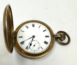 Gold plated full hunter pocket watch the watch is ticking