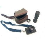 Zenit Zenith 12XP 35mm SLR Camera and a selection of lenses and a camera bag
