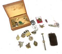 Box of collectable items to include cap badges etc