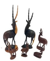 Selection of carved wooden deer figures
