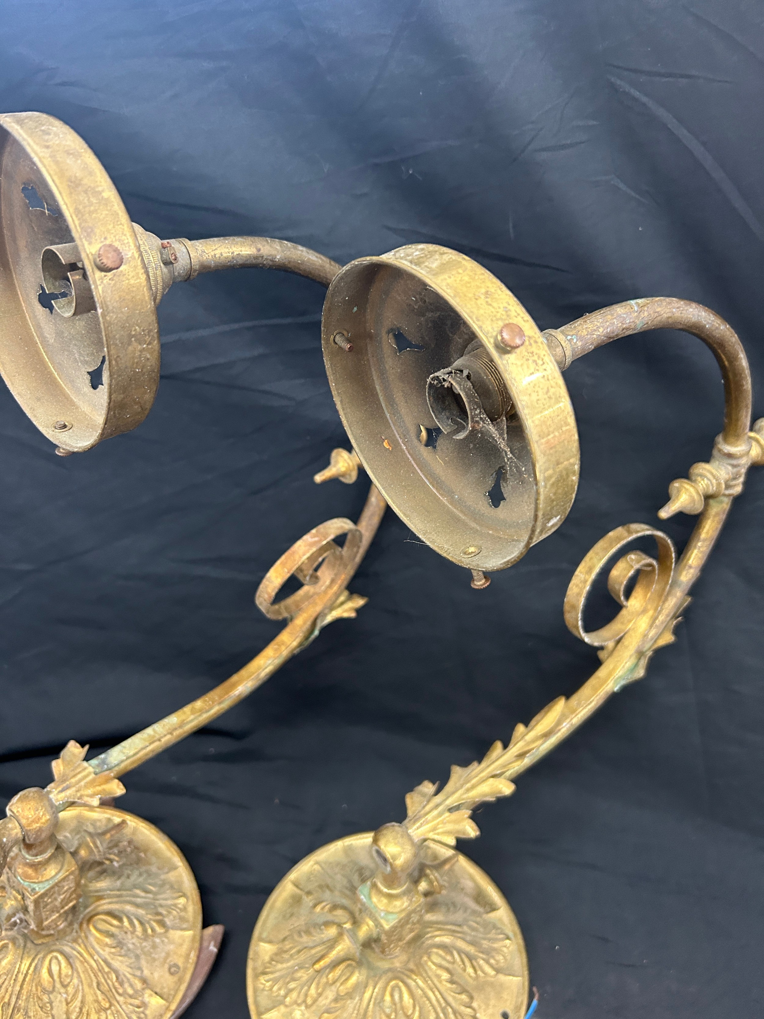 Pair of brass electric ornate wall lamps