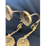 Pair of brass electric ornate wall lamps