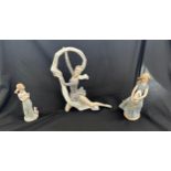 Lladro girl and cat figure along with 2 nao figures includes ballerina and girl with bunny