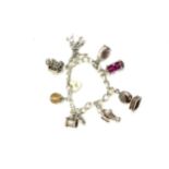 Ladies silver and white metal charm bracelet