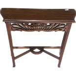 Mahogany carved hall table measures approx 30 inches tall by 32 inches wide
