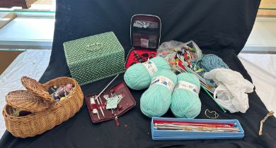 Selection of knitting accessories to include pins, cotton, baskets etc