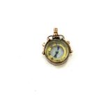 Antique 9ct rose gold compass charm in working order, approximate weight 2.8g
