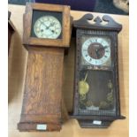 Two vintage wall hanging clocks both two key hole- untested without key or pendulum Largest measures