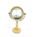 Vintage decorative toilet mirror measures approximately 18.5 inches tall
