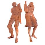 Pair of wooden figures, height approximately 24 inches tall