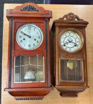 Two vintage two key hole wall hanging clocks a P.Watts and Sons and a Polaris- both with