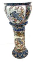 Oriental hand painted jardanier and stand measures approximately 25 inches tall 10 inches diameter