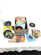 Large selection of assorted 45s includes the beetles, Wham etc