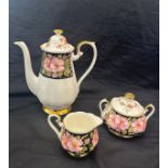 Three pieces of Royal Albert pattern Provincial Rose Alberta Rose a tea pot, sugar bowl and milk jug