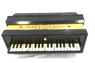 Vintage harmonica by A.T.Pole pianos organs harmoniums Leicester marked Busson Brevette Paris