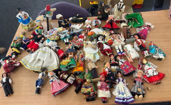 Large selection of assorted vintage small souvenir dolls