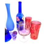 Selection of coloured glassware to include vases, bells etc