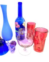 Selection of coloured glassware to include vases, bells etc