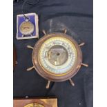 Selection of vintage barometers and a volt meter