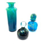 Three pieces of signed coloured glassware to include a vase, paper weight and a scent bottle-