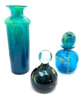 Three pieces of signed coloured glassware to include a vase, paper weight and a scent bottle-