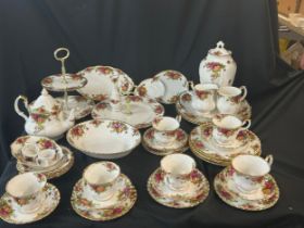 Royal Albert Old Country Rose Tea Service to include 6 cups,6 saucers,cake stand etc . Approximately