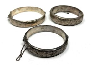 Three Silver Bangles With Engraved Designs