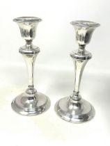 Pair of silver hallmarked candlesticks filled bases