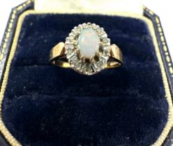 9ct Gold Diamond & White Opal Oval Halo Ring (2.3g)