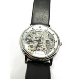 gents mid size skeleton dial rotary wristwatch the watch is ticking