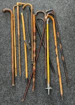 Collection of vintage and antique walking sticks, Shillelagh club etc