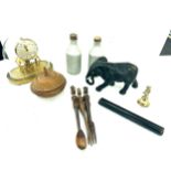 Selection of collectable pieces to include naval ship rolling ruler, carved african salad set,