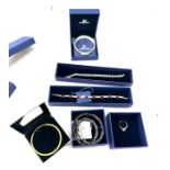 5 boxed Swarovski jewellery pieces to include rings, necklaces, bangle etc